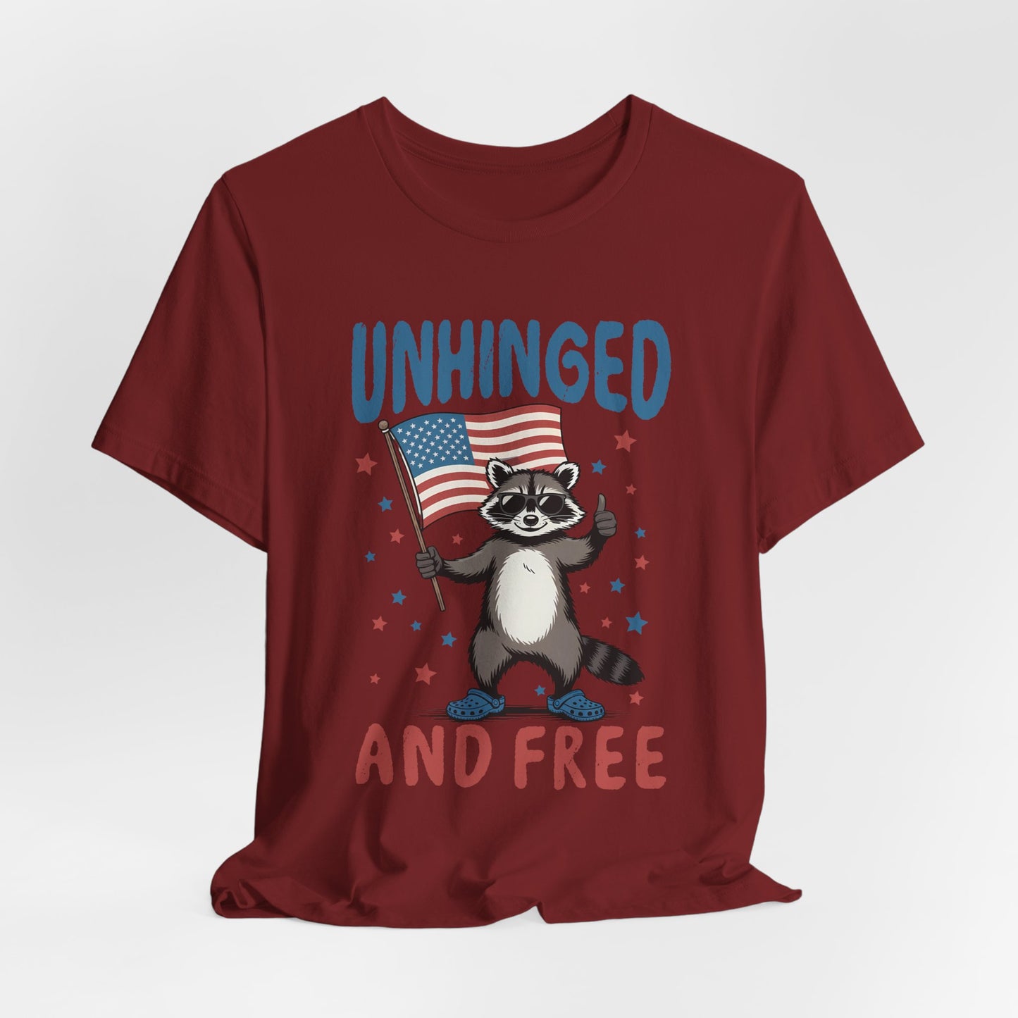 T‑Shirt — "Unhinged and Free" Raccoon American Flag Graphic Tee