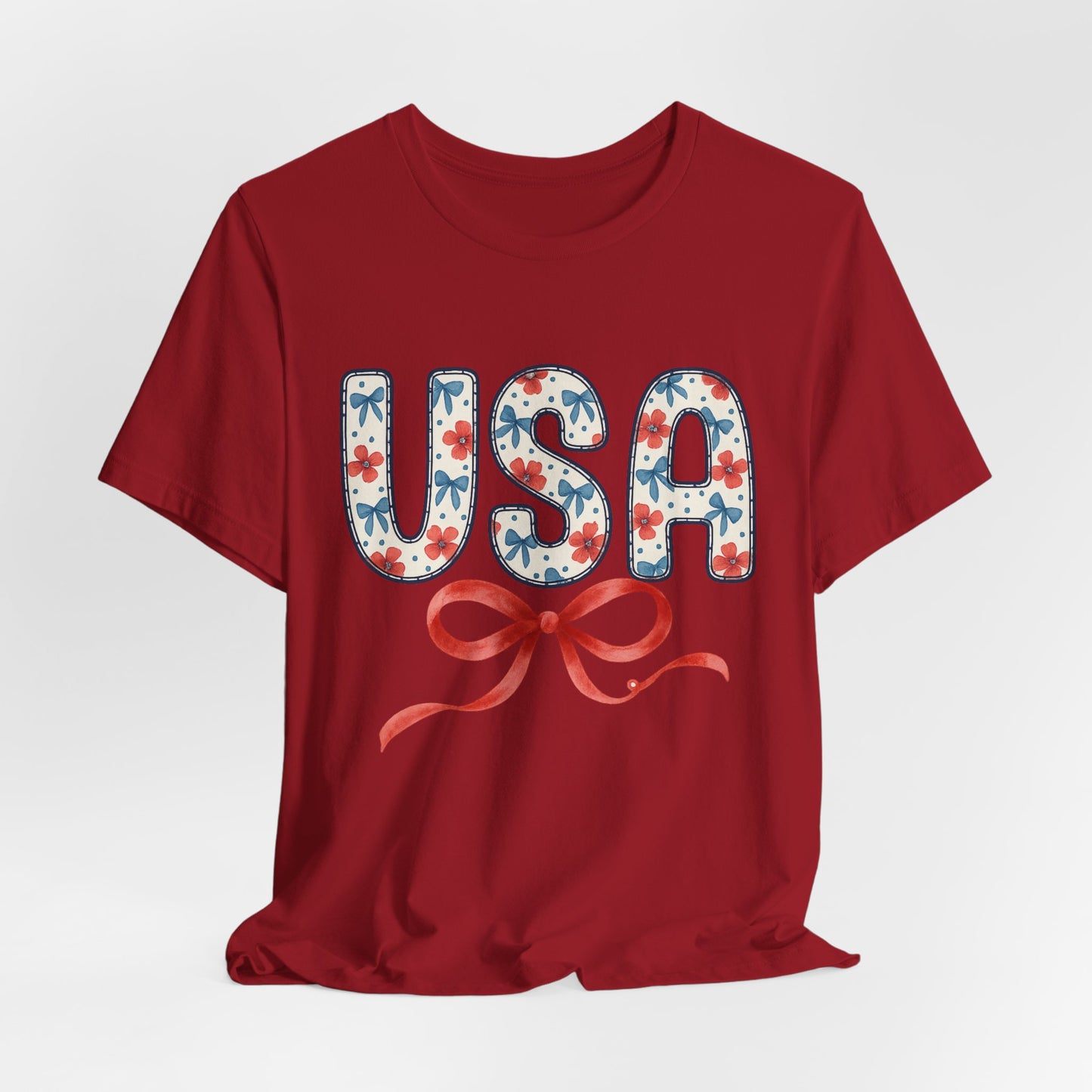 USA Floral Graphic Tee with Ribbon – 4th of July Patriotic Shirt