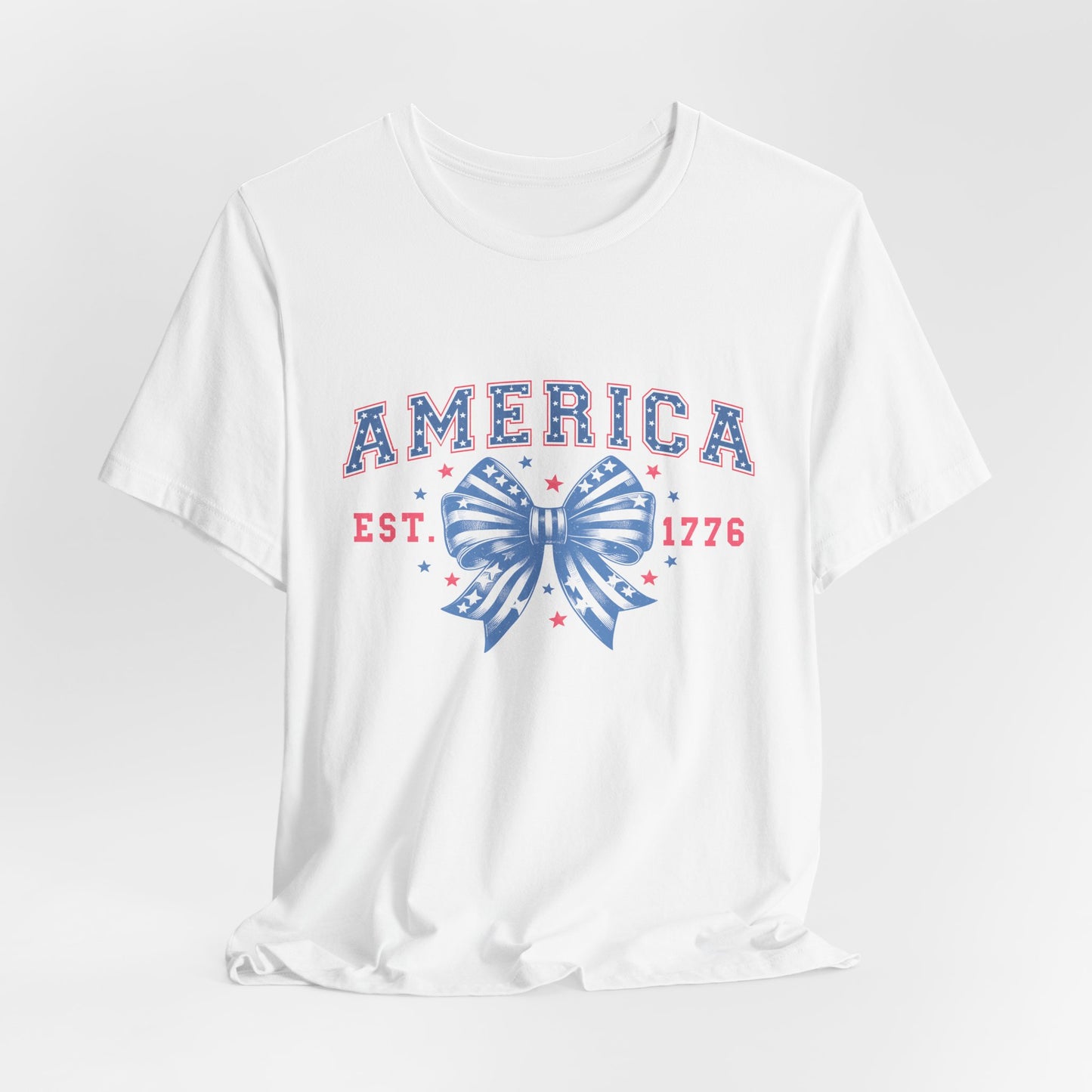 America Est. 1776 Patriotic T-Shirt – Stars & Stripes Bow Graphic
