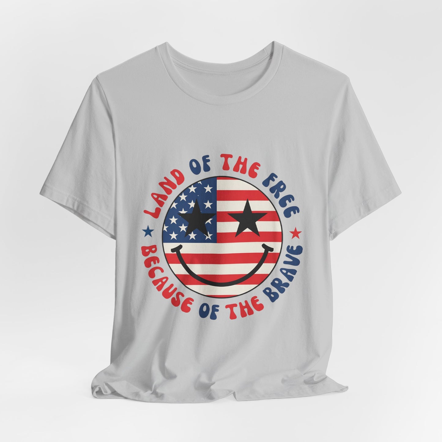 Patriotic Smiley Tee - "Land of the Free Because of the Brave" American Flag Shirt