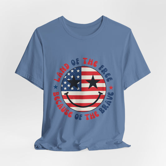 Patriotic Smiley Tee - "Land of the Free Because of the Brave" American Flag Shirt