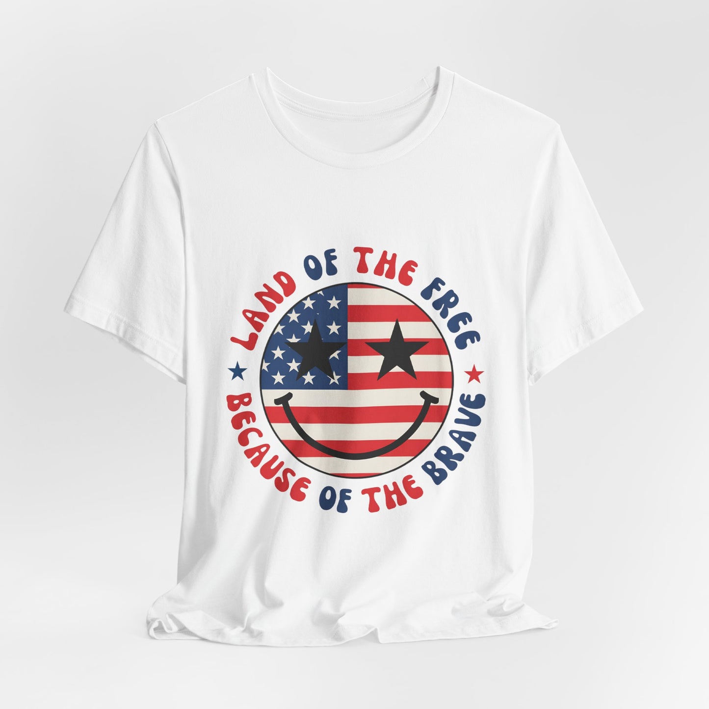 Patriotic Smiley Tee - "Land of the Free Because of the Brave" American Flag Shirt