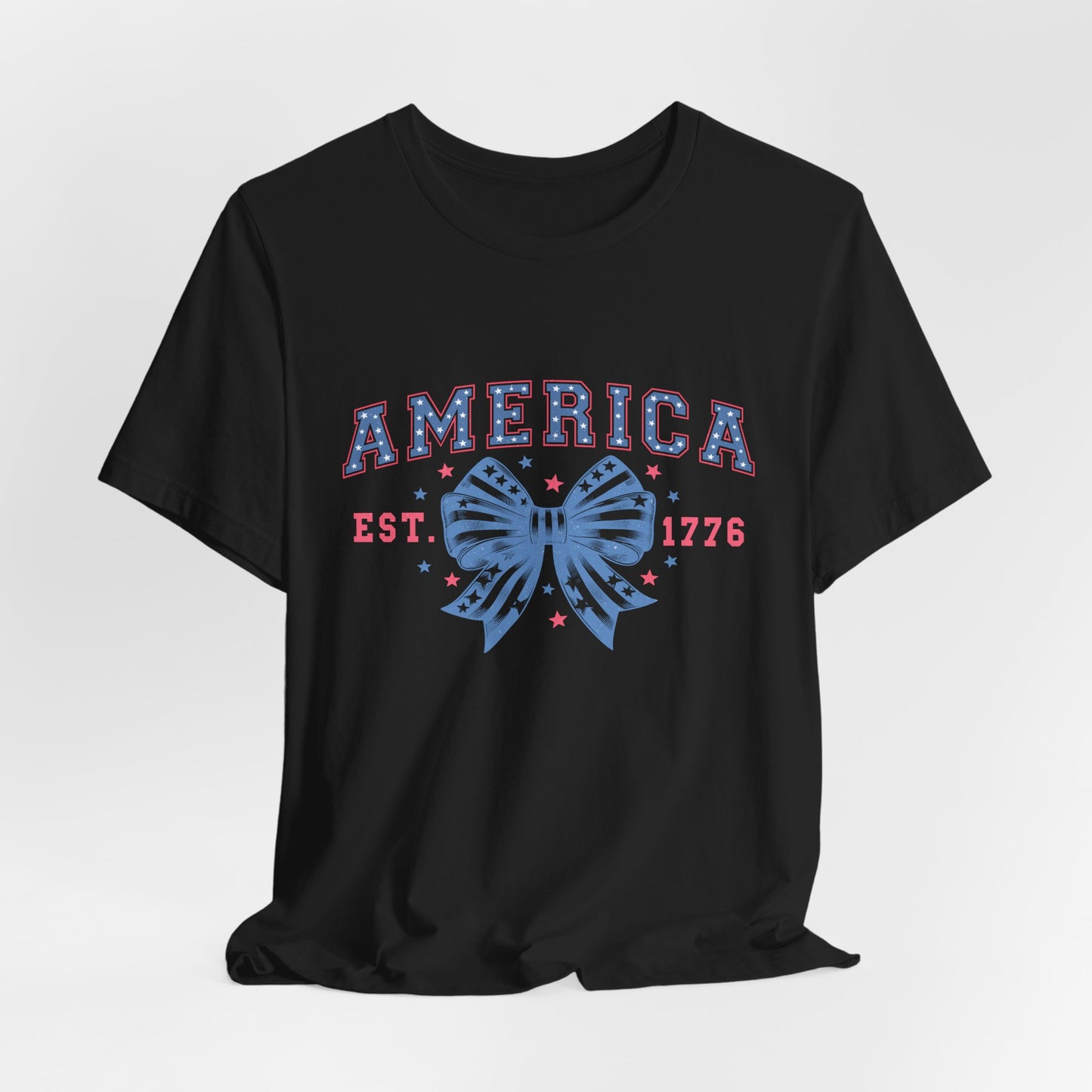 America Est. 1776 Patriotic T-Shirt – Stars & Stripes Bow Graphic