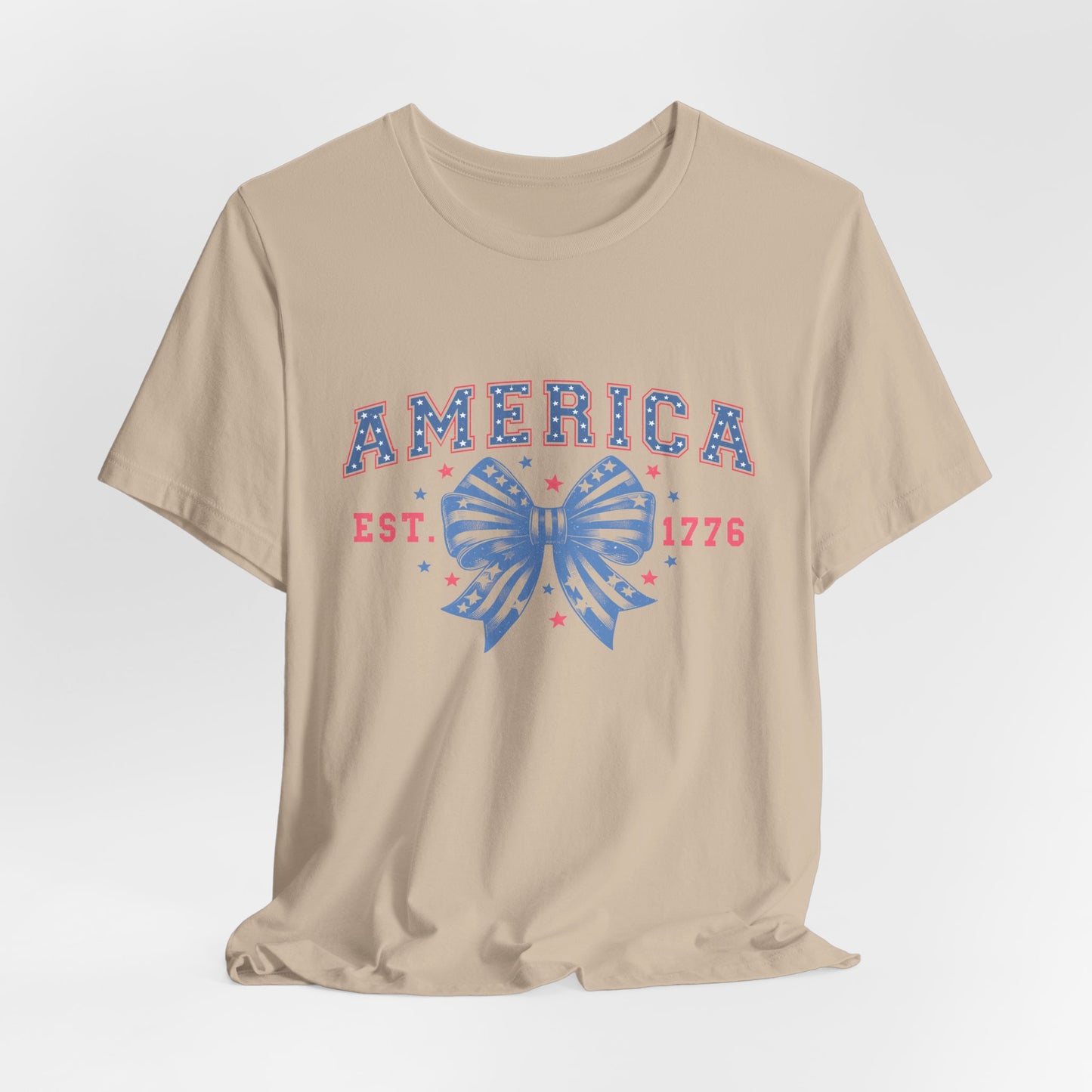America Est. 1776 Patriotic T-Shirt – Stars & Stripes Bow Graphic