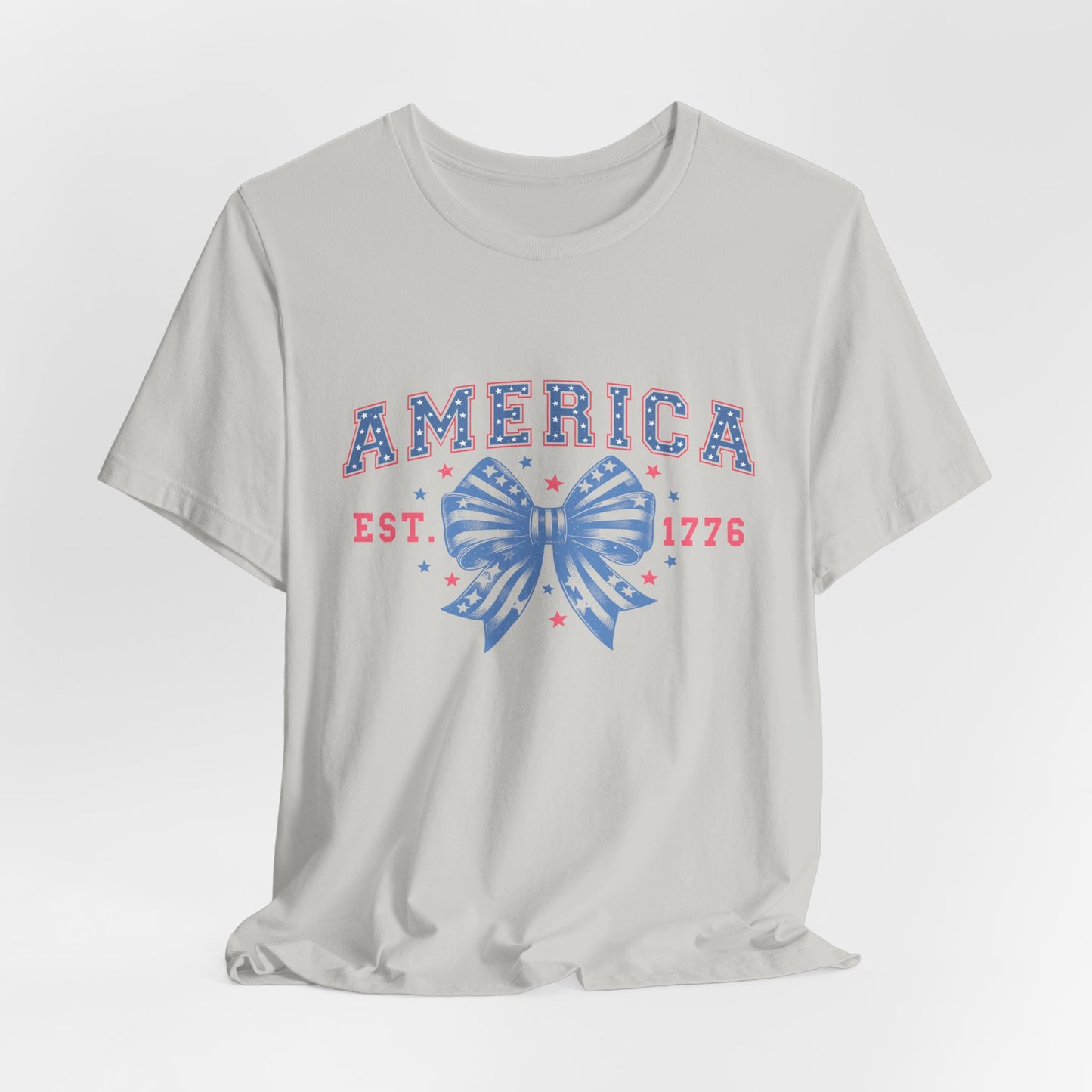 America Est. 1776 Patriotic T-Shirt – Stars & Stripes Bow Graphic