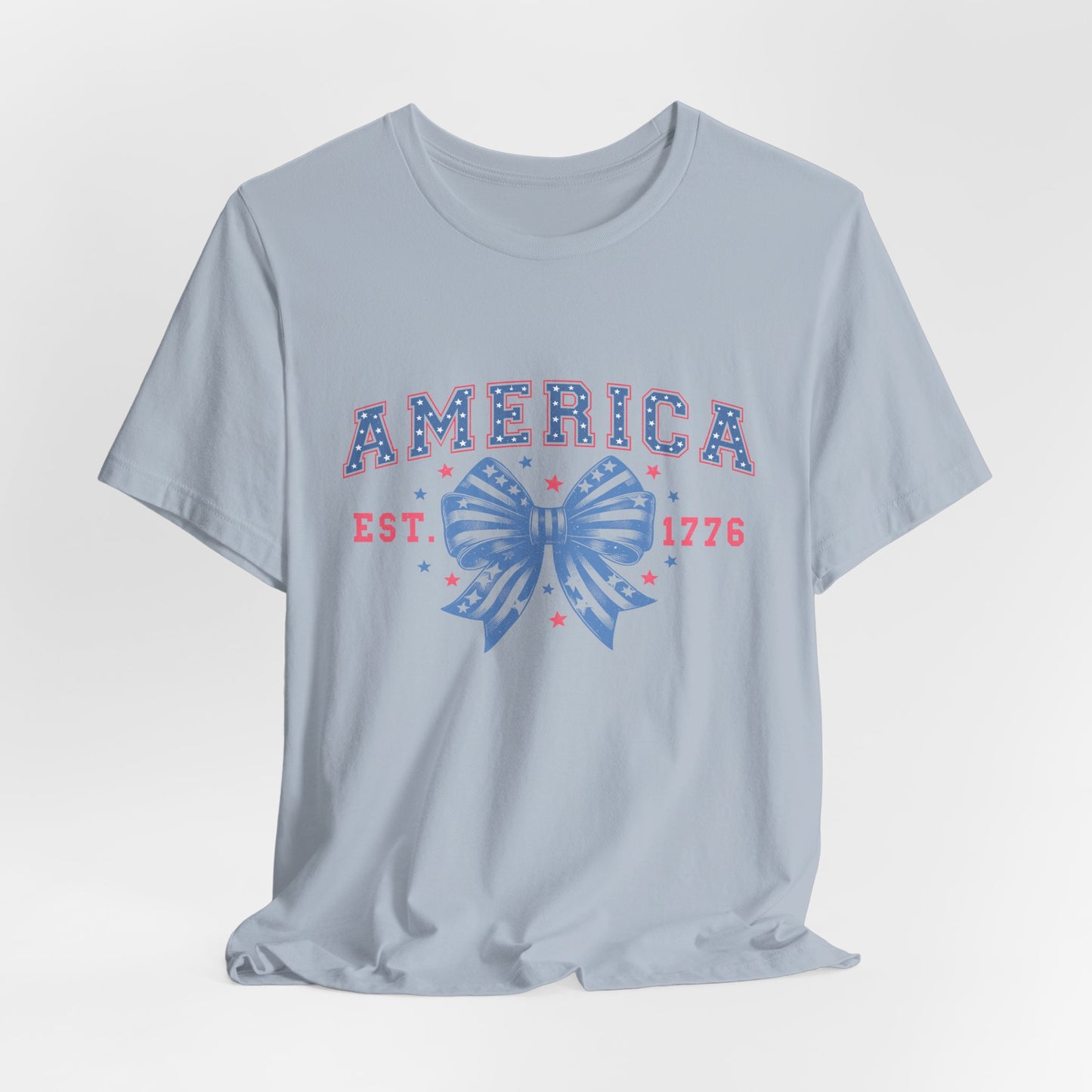 America Est. 1776 Patriotic T-Shirt – Stars & Stripes Bow Graphic